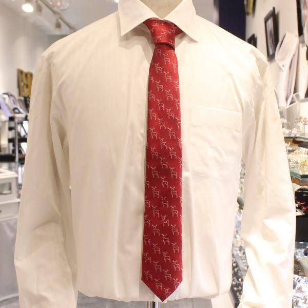 ベルを着けたトナカイのクリスマスネクタイ