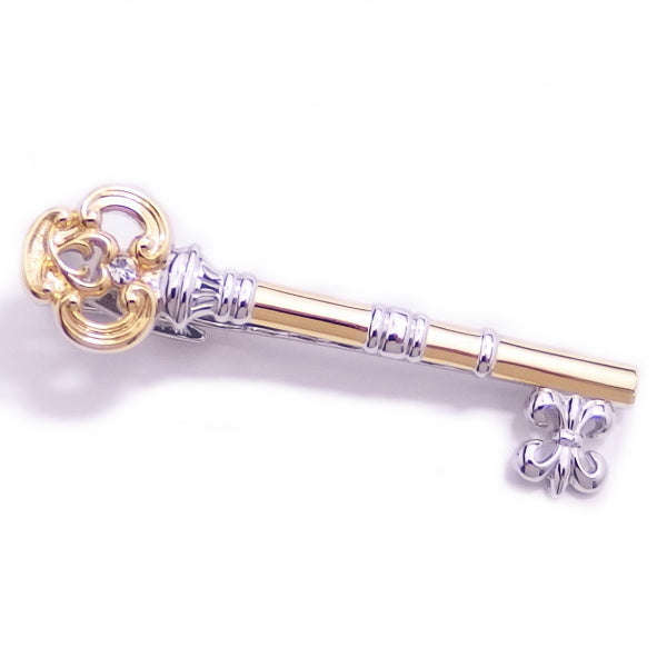 Two colors available, with a sparkling stone, a secret key motif tie pin