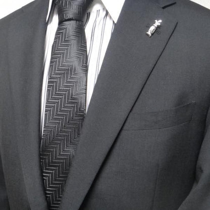 ナイスショットを狙ってゴルフバッグのタイタック(ピンブローチ)